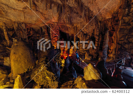 Tourists in Dikteo Andro Cave also known as birth place of Zeus in Crete Tourists in Dikteo Andro Cave also known as birth place of Zeus in Crete 62400312