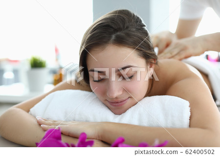 Massage in salon using relaxation techniques. Massage in salon using relaxation techniques. 62400502