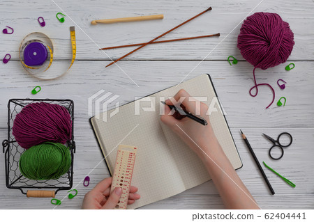 Background with knitting and crocheting tools and 62404441