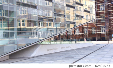 COPENHAGEN, DENMARK - JUL 05th, 2015: Crystal and Cloud, Nycredit headquarters, modern architecture in Kalvebod Brygge in Copenhagen COPENHAGEN, DENMARK - JUL 05th, 2015: Crystal and Cloud, Nycredit headquarters, modern architecture in Kalvebod Brygge in Copenhagen 62410763