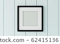 Blank black  picture frame on the wood wall. 3d render. 62415136