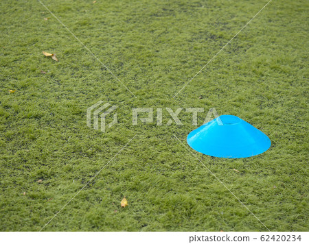 Selective focus to cones on green artificial turf Selective focus to cones on green artificial turf 62420234