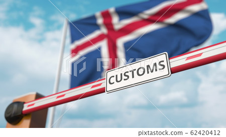 Closed boom gate with CUSTOMS sign on the Icelandic flag background. Border closure or protective tariffs in Iceland. 3D rendering 62420412
