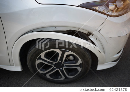 white car has a small bump crash, due to a slight white car has a small bump crash, due to a slight 62421878