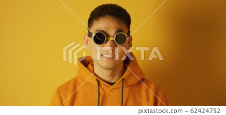 Young man wearing welding goggles Young man wearing welding goggles 62424752