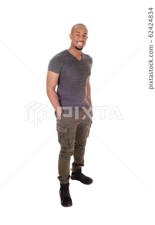 Happy African Man standing with his hands in his Happy African Man standing with his hands in his 62424834