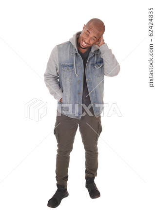 African man with his hand behind his head, African man with his hand behind his head, 62424835