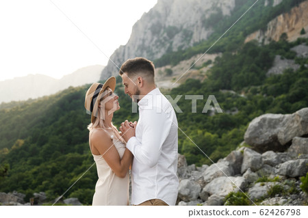 Young couple in love on the nature. 62426798