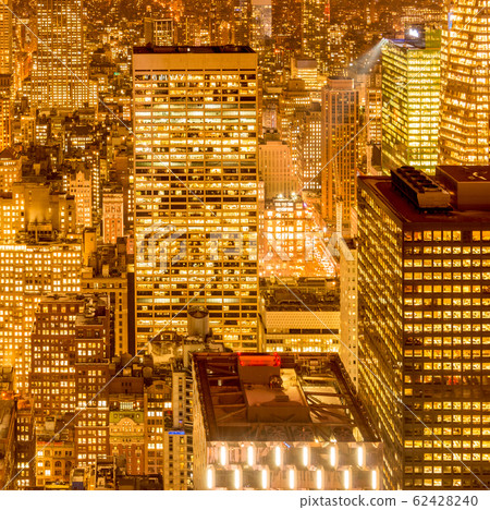 View of New York Manhattan during sunset hours View of New York Manhattan during sunset hours 62428240