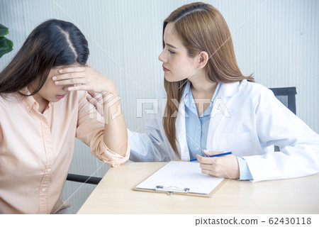 Woman doctor and patient consultation with 62430118