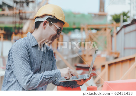 Young asian engineers are working on the construction site 62431433