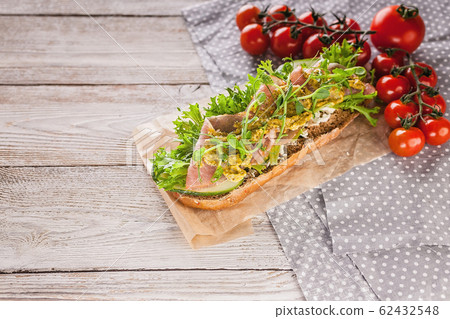 Bruschetta with raw smoked meat, cream cheese 62432548
