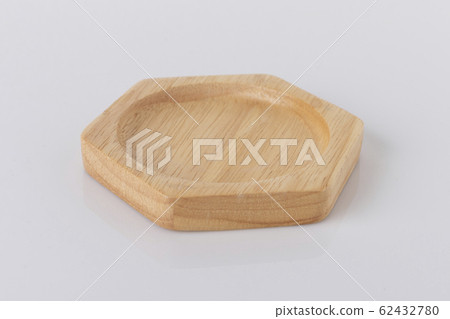 Hexagon shaped wooden tray on a white background 62432780