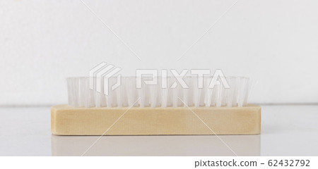 Clothes cleaning brush isolated on white Clothes cleaning brush isolated on white 62432792