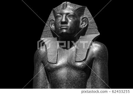 Pharaoh Egyptian gods dead religion symbol stone statue isolated on black. Stone pharaoh tutankhamen mask on black background 62433255