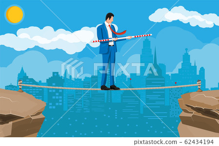Businessman in suit walking on rope 62434194