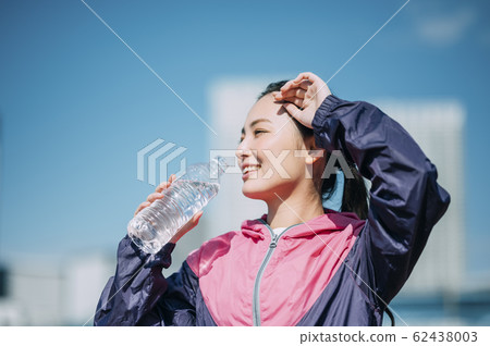 woman hydrating woman hydrating 62438003