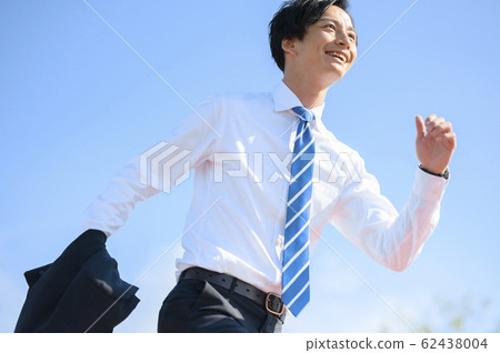 Refreshing businessman Refreshing businessman 62438004