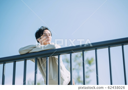 Man outdoors 62438026