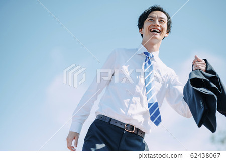 Refreshing businessman Refreshing businessman 62438067