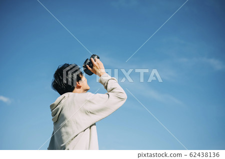 Camera and male 62438136