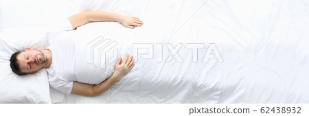 Young caucasian beauty woman sleeping on white bed Young caucasian beauty woman sleeping on white bed 62438932