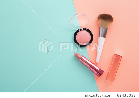 Lipstick, blush and brush on pastel color Lipstick, blush and brush on pastel color 62439055