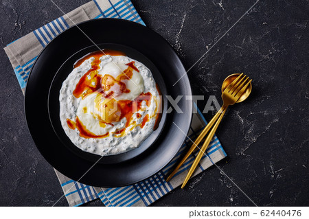 cilbir, poached eggs in dill yogurt sauce cilbir, poached eggs in dill yogurt sauce 62440476