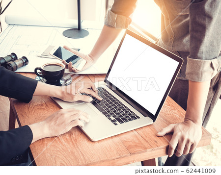 Asia startup business concept : Group of young asia startup business people using laptop and mobile phone at meeting. 62441009