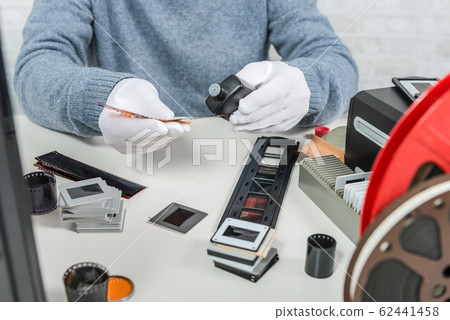 technician scan a negative film technician scan a negative film 62441458