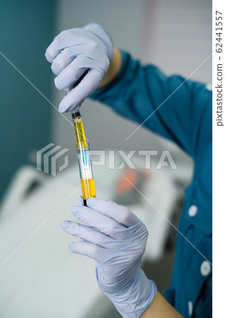 beautician is gaining blood in syringe from tube test beautician is gaining blood in syringe from tube test 62441557