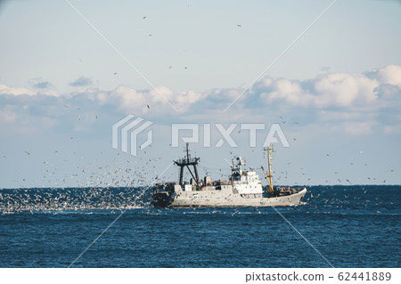 Fishing boat in the sea. 62441889