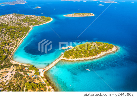 Aerial view of beutiful small island in sea bay at sunny day in summer in Murter, Croatia. Top view Aerial view of beutiful small island in sea bay at sunny day in summer in Murter, Croatia. Top view 62443002