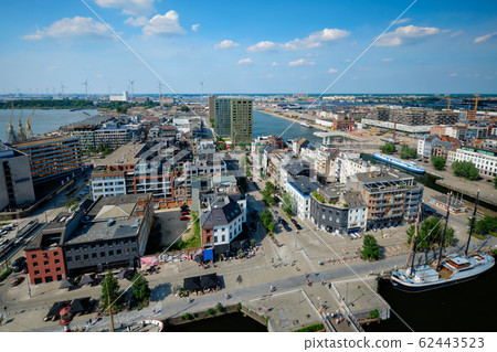 Aerial view of Antwerp city with port crane in cargo terminal. Antwerpen, Belgium 62443523