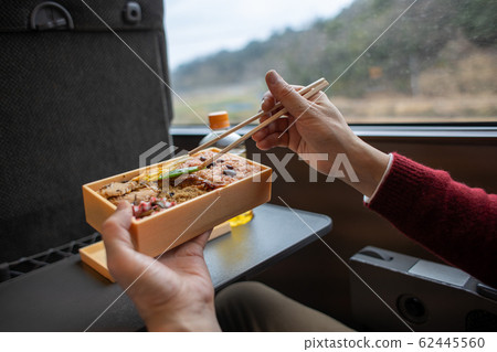 Ekiben to eat on a train while traveling 62445560