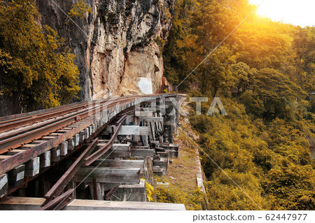Train ride on the Death railway (river Kwai, Thailand). Death Railway train passing over the Tham Krasae Viaduct. Thai-Burma Railway 62447977