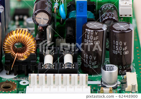 Various electronic components on the electronic board. Various electronic components on the electronic board. 62448900