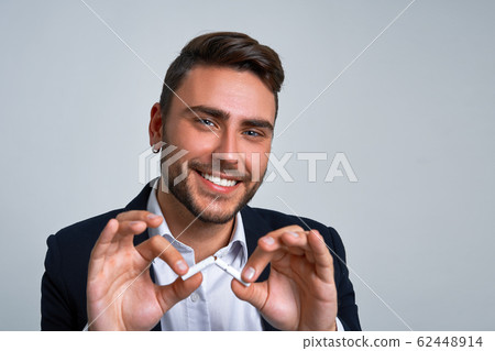 Close up portrait young man businessman. Caucasian 62448914