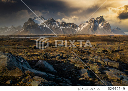 Sunset at Vestrahorn Mountain and Stokksnes beach. Iceland Sunset at Vestrahorn Mountain and Stokksnes beach. Iceland 62449549