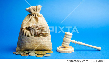Money bag and judge's hammer. Penalty for a crime and offense. Financial punishment. Violations of traffic laws. Fraud. Fine, penalization, mulct. Gavel Money bag and judge's hammer. Penalty for a crime and offense. Financial punishment. Violations of traffic laws. Fraud. Fine, penalization, mulct. Gavel 62450890