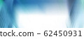 Wide abstract banner, business modern city urban futuristic architecture panoramic background, motion blur, reflection in glass of high rise skyscraper facade, toned blue picture with bokeh. 62450931