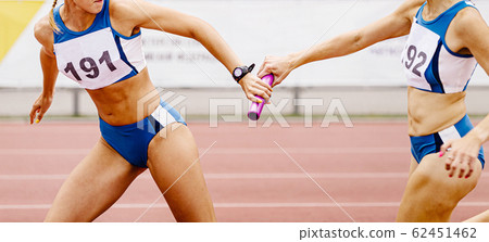 relay race passing of baton 62451462