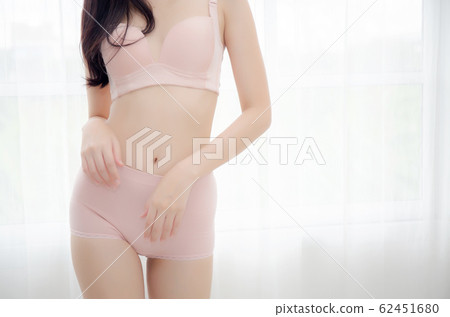 Closeup asian woman wear underwear beautiful body belly slim shape sexy with diet at room 62451680