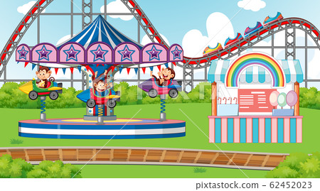 Scene with happy monkeys riding rocket ride in the 62452023