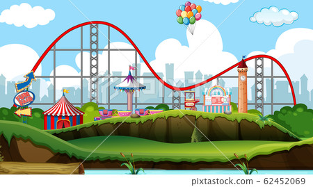 Scene with roller coaster and other rides in the 62452069