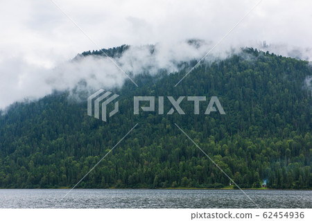 Foggy Teletskoye lake in Altai mountains 62454936