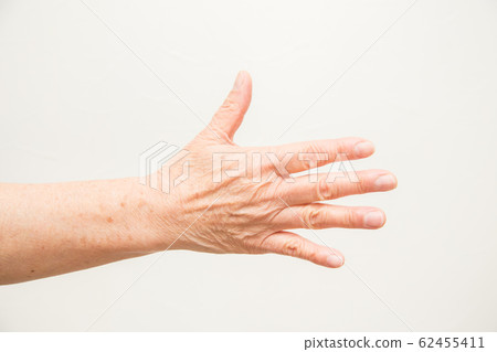 Senior woman at hand 62455411