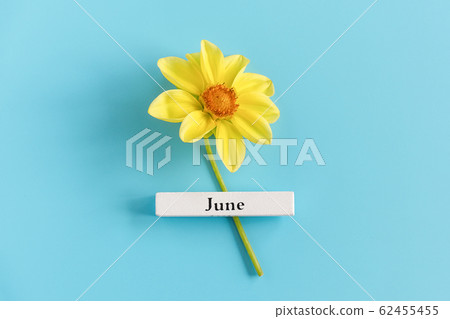 Wooden calendar summer month of June and yellow Wooden calendar summer month of June and yellow 62455455