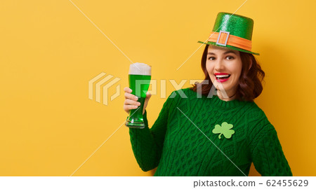 woman in leprechaun hat 62455629