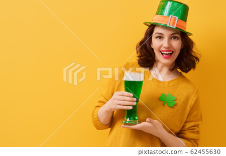 woman in leprechaun hat 62455630